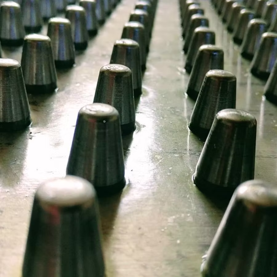 Pin plates for a leather staking machine